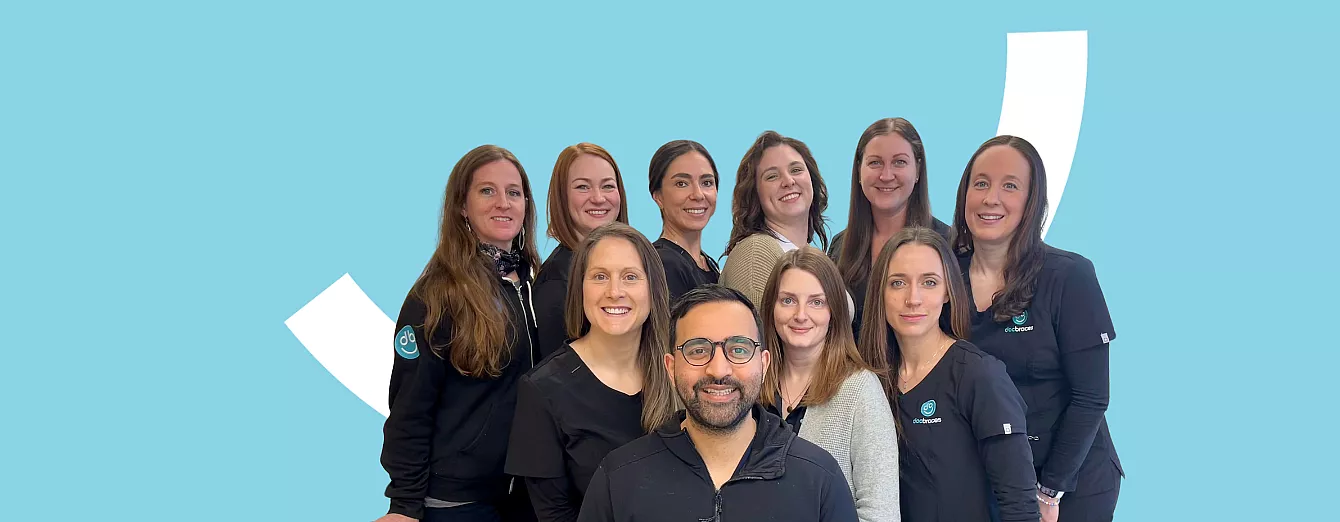 blue background with docbraces logo and orthodontics staff standing in front - blog headers